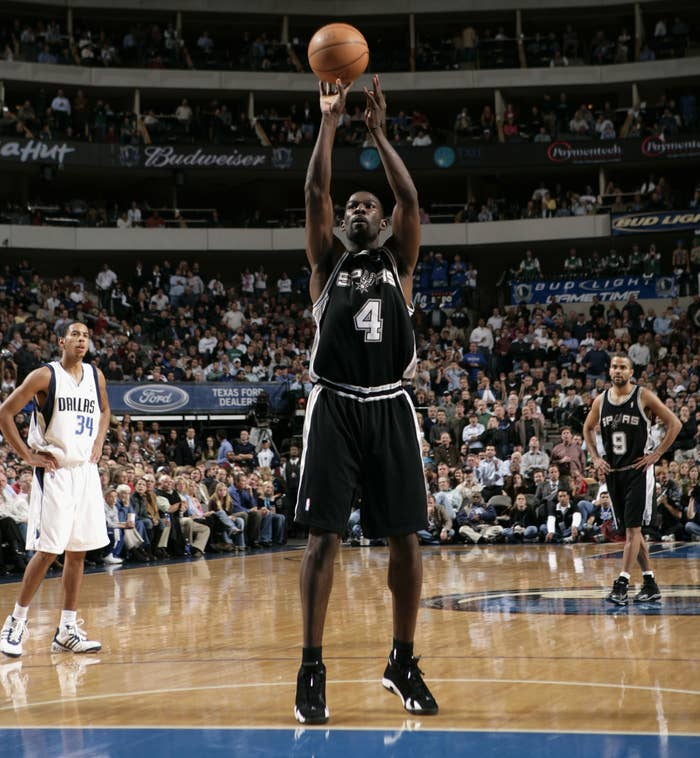 Michael Finley #4 of the San Antonio Spurs shoots a free throw against the Dallas Mavericks during the game at American Airlines Arena on December 1, 2005 in Dallas, Texas.