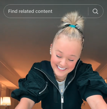Screenshot of her smiling