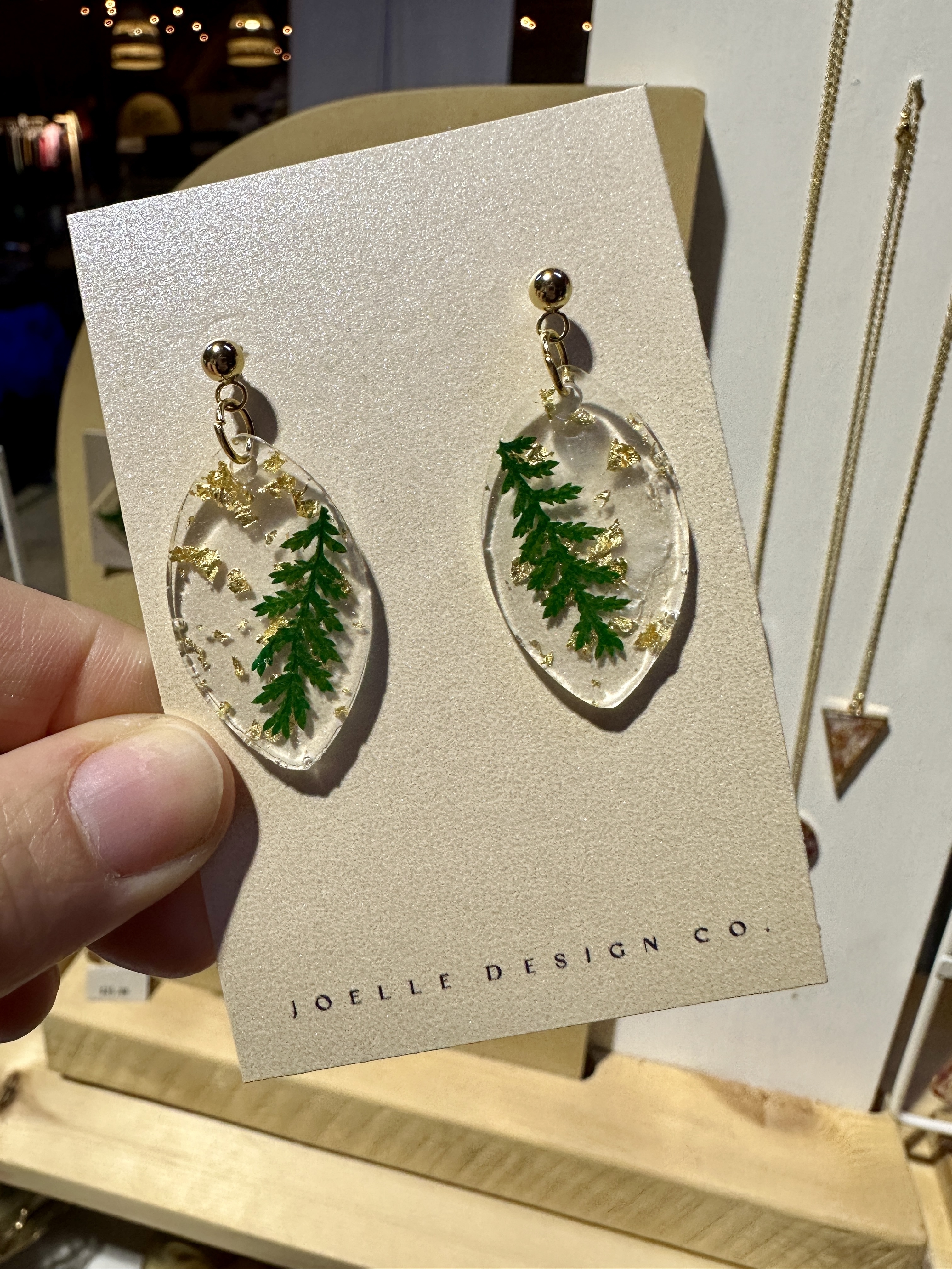 A pair of Joelle Design Co. earrings