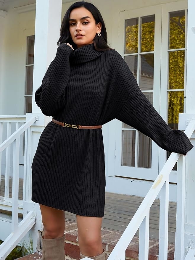 model wearing the sweater dress in black