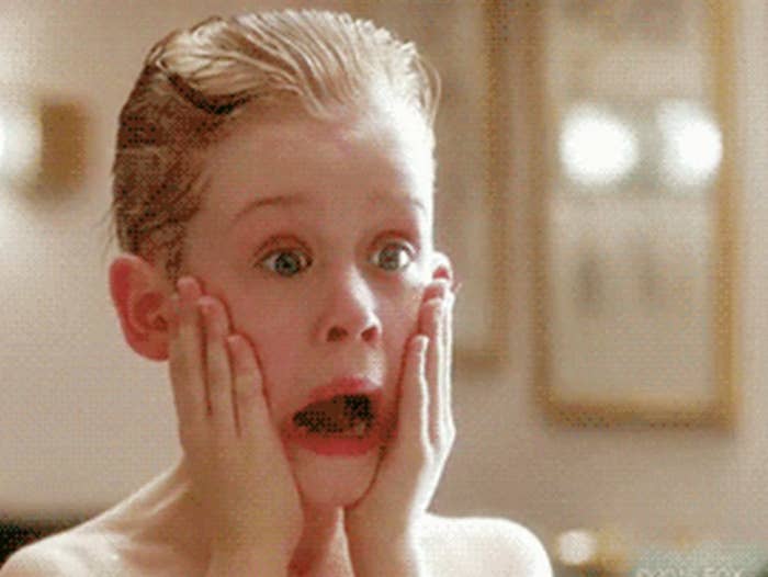 McCauley Culkin screaming with hands on face