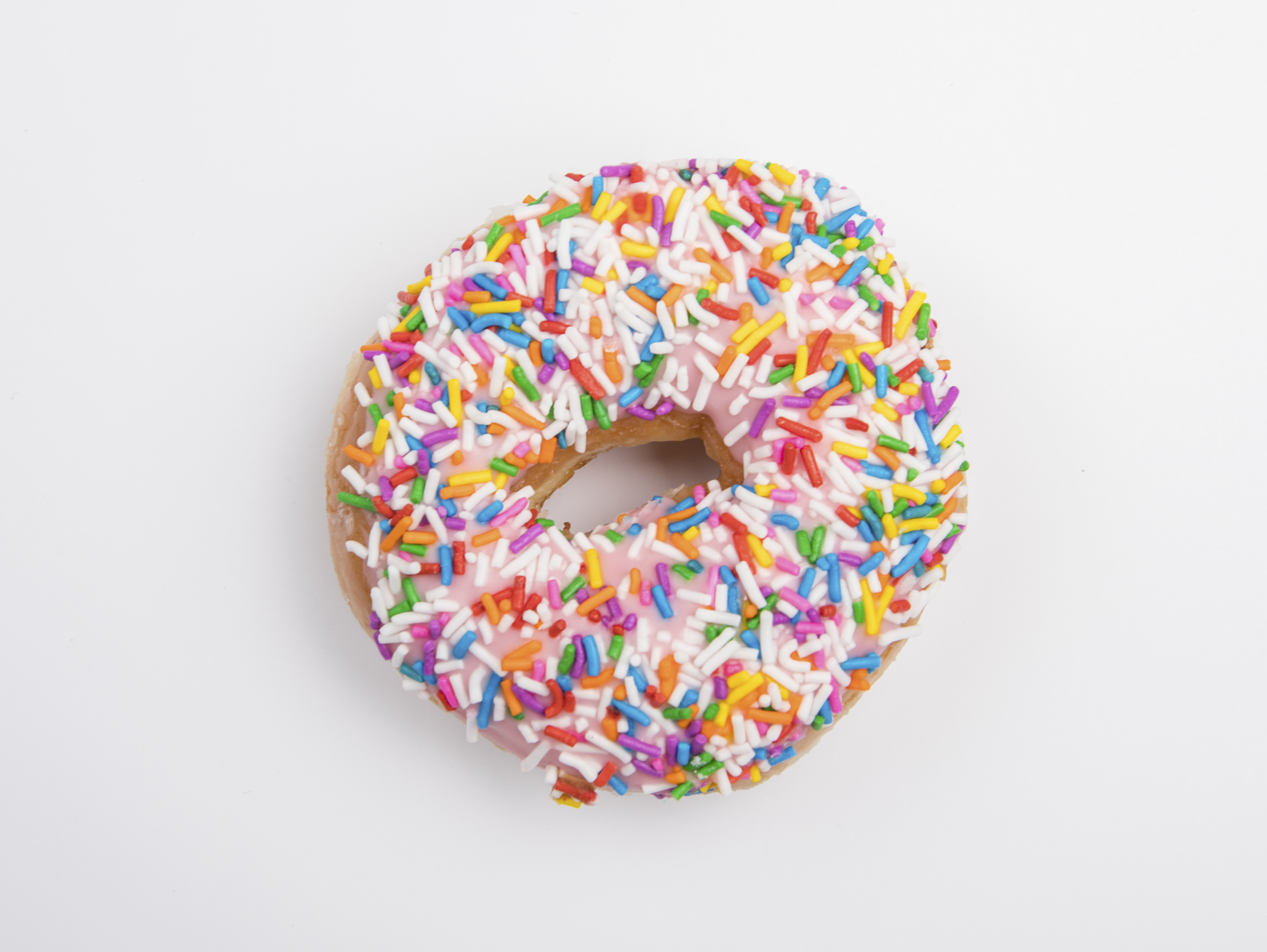 Closeup of a donut with sprinkles