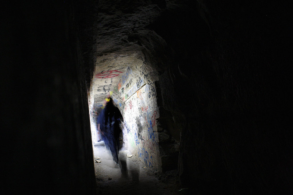 Someone walking in the catacombs