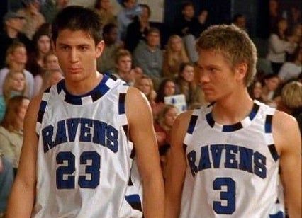 Nathan and Lucas on the court in their jerseys