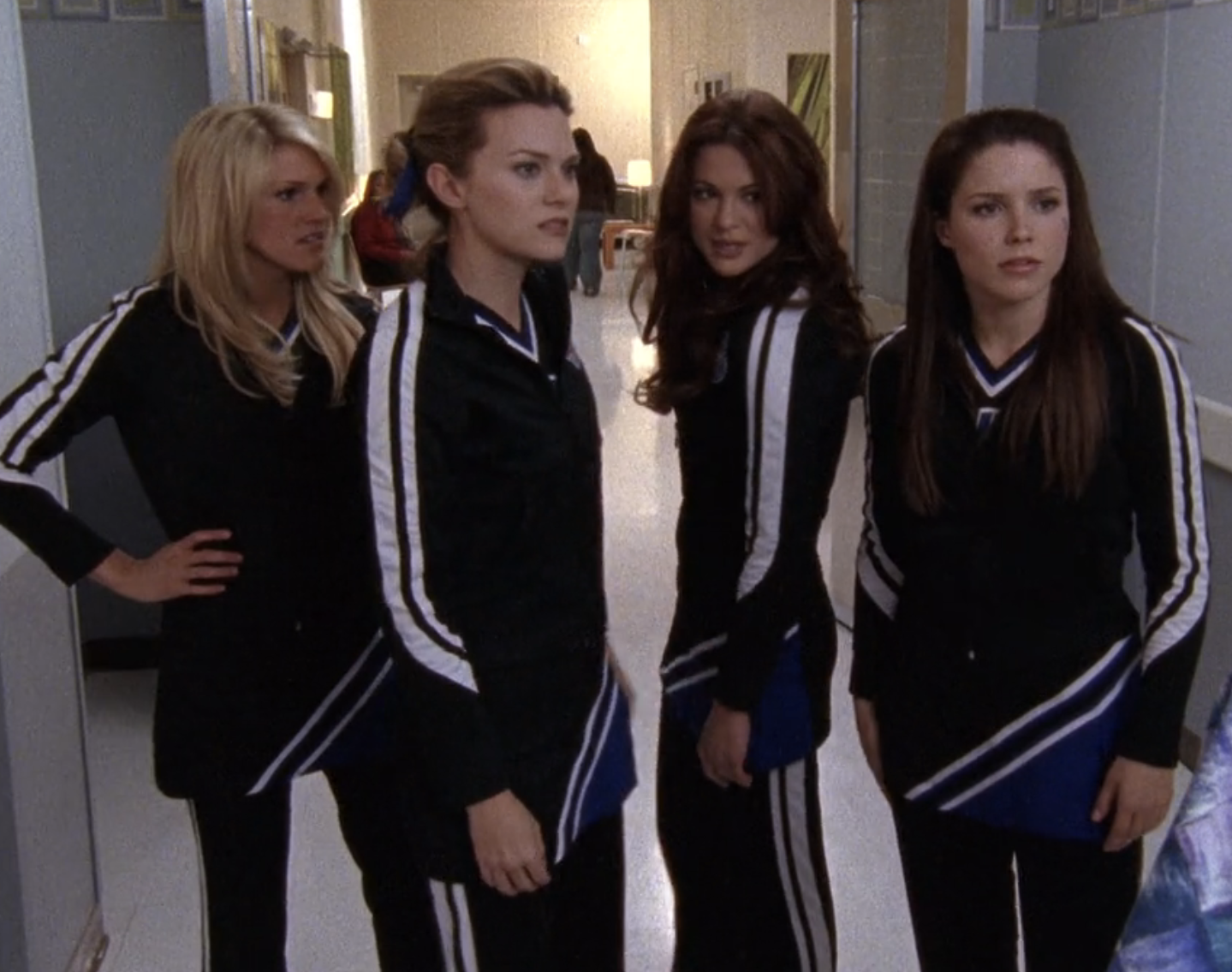 the girls in cheerleading uniforms