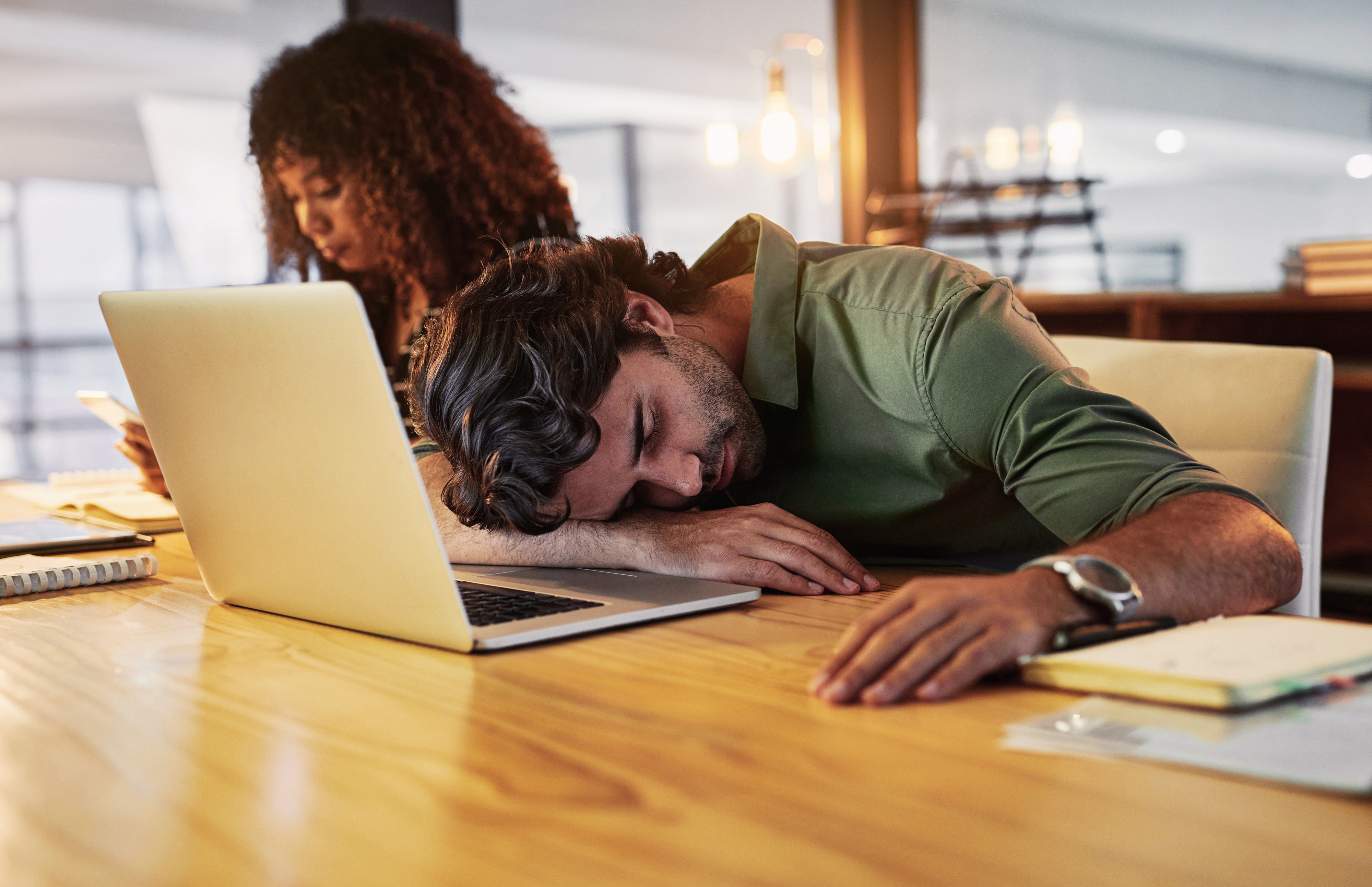 guy asleep at his laptop