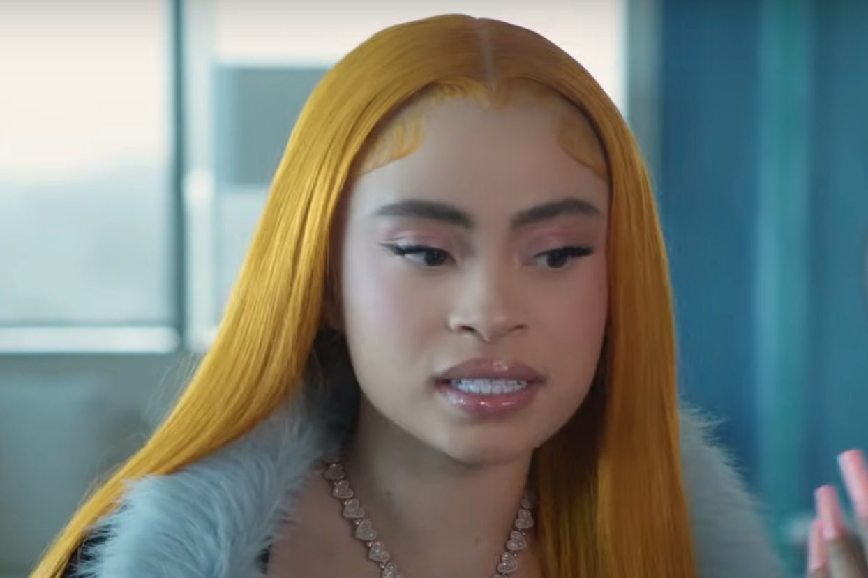Ice Spice looking down and cringing in a Dunkin&#x27; commercial