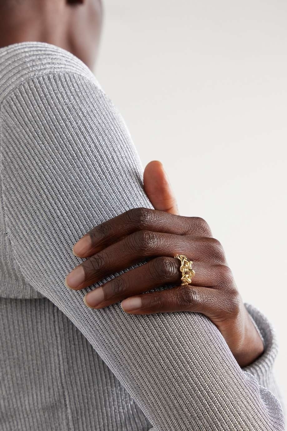 model wearing the gold vermeil ring