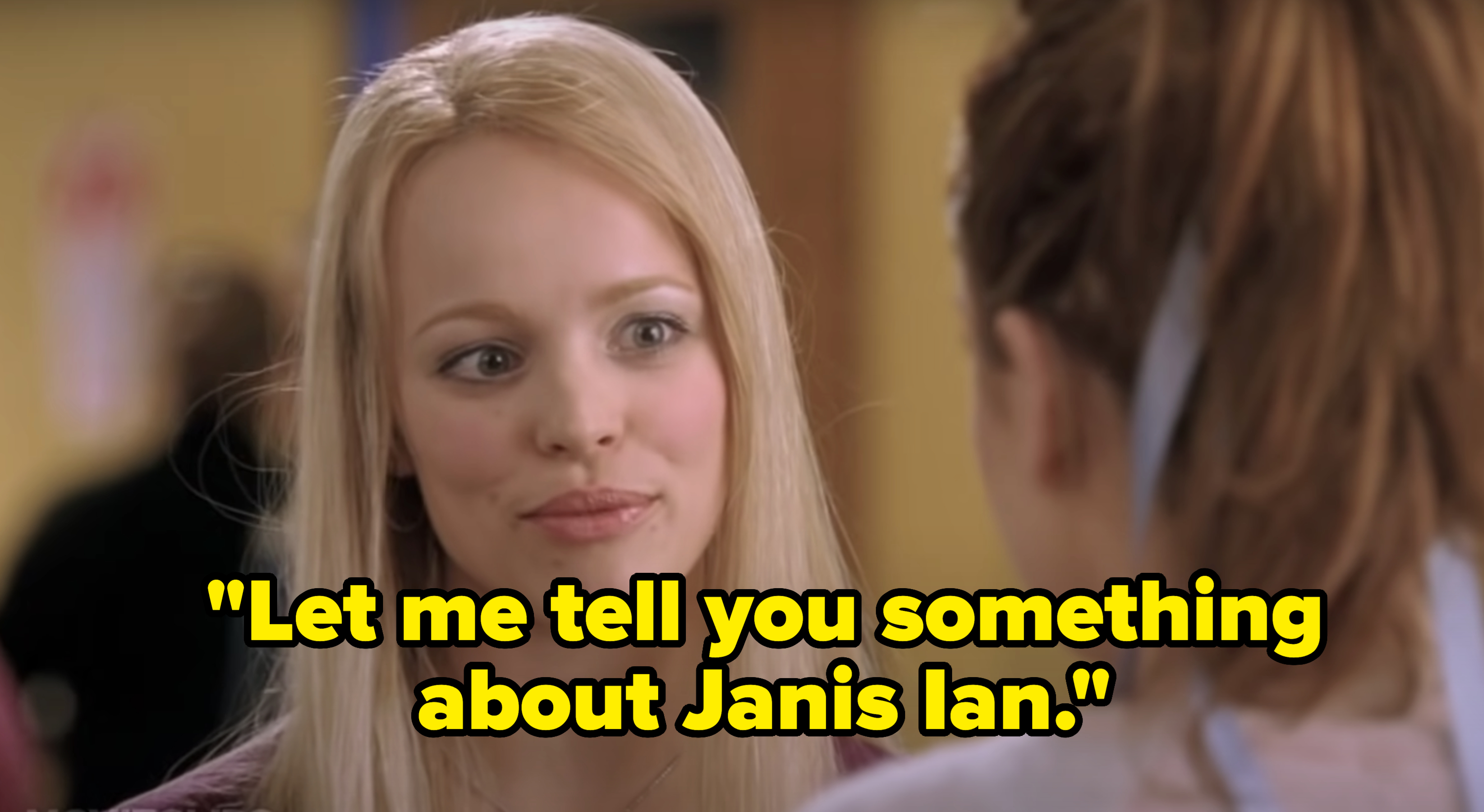 Regina George in the hallway looks at Cady Heron. Text reads &quot;Let me tell you something about Janis Ian.&quot;