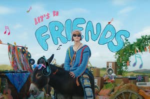 A K-pop artist riding a donkey.