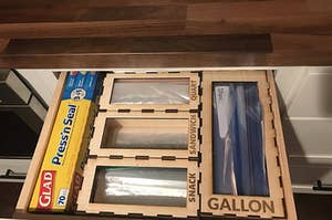open kitchen drawer with dividers for different sized sandwich bags
