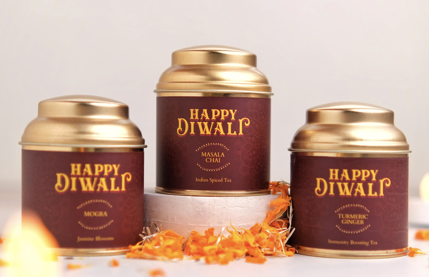Three canisters of tea celebrating Diwali