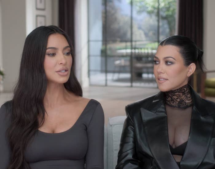 Close-up of Kim and Kourtney sitting together