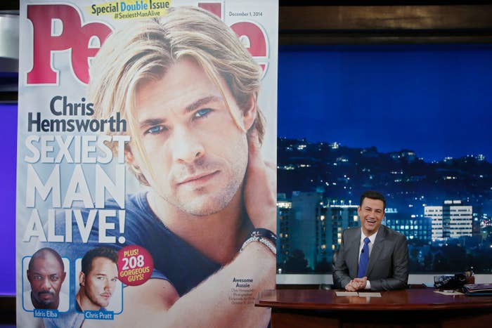 Jimmy with a People magazine cover showing Chris Hemsworth as the Sexiest Man Alive