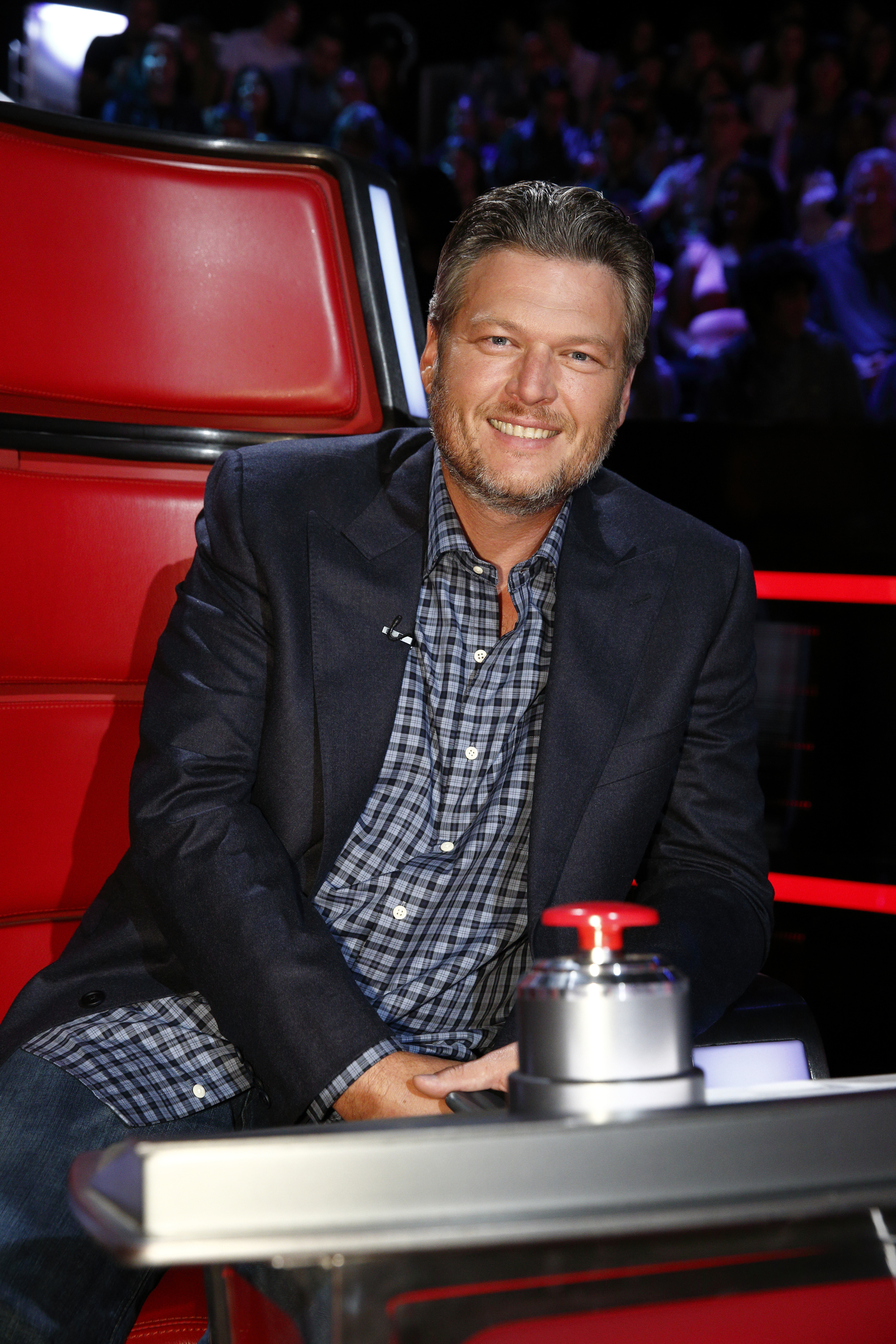 Close-up of Blake sitting on The Voice