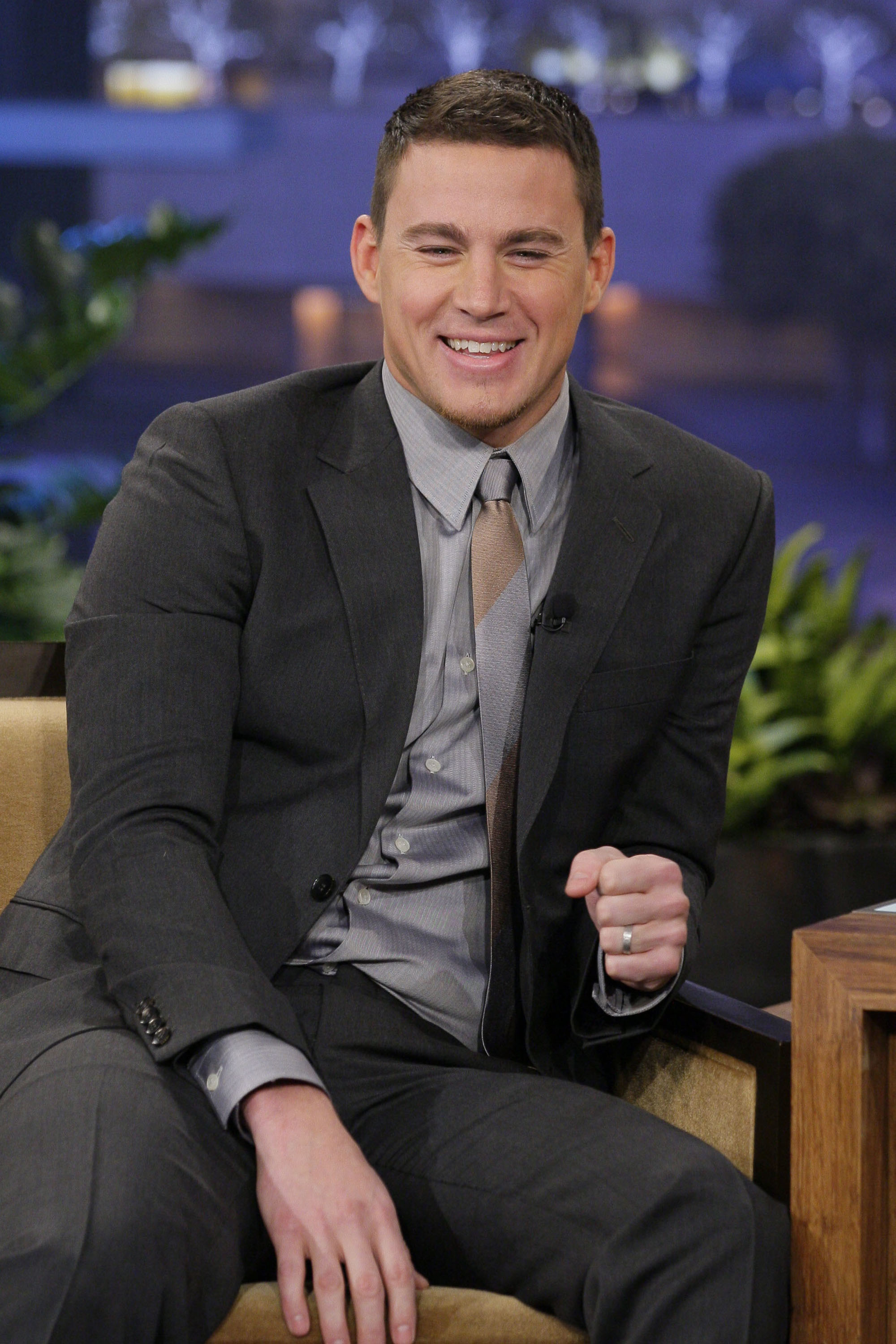 Close-up of Channing on a talk show in a suit and tie
