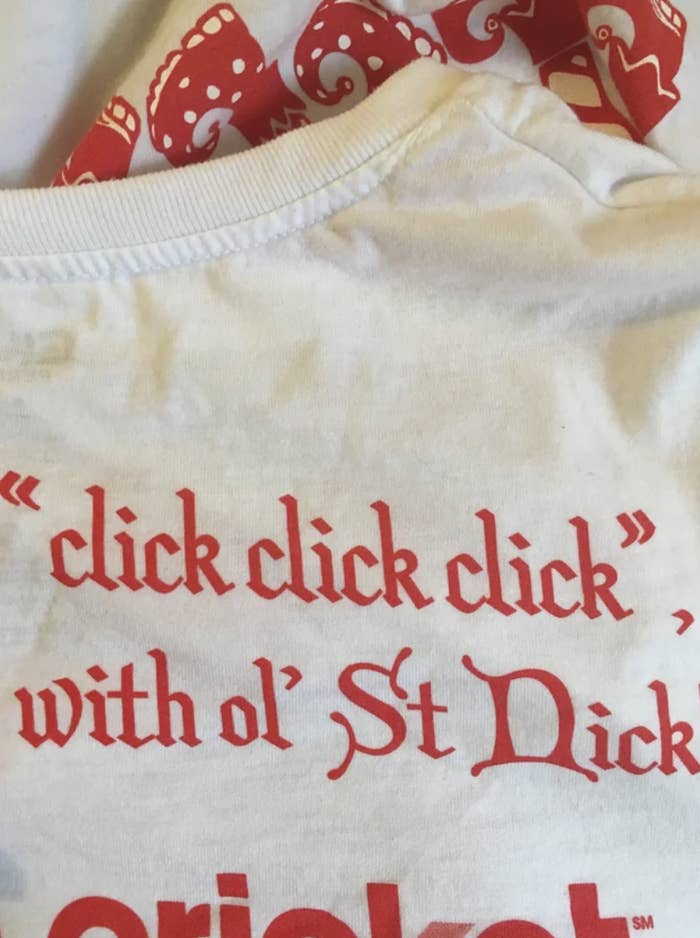 a shirt that says, "click click click, with ol' St Nick" but the "N" looks like a "D"