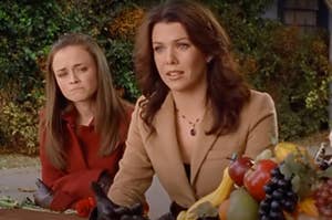 Rory and Lorelai at Sookie's Thanksgiving table.