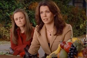 Rory and Lorelai at Sookie's Thanksgiving table.
