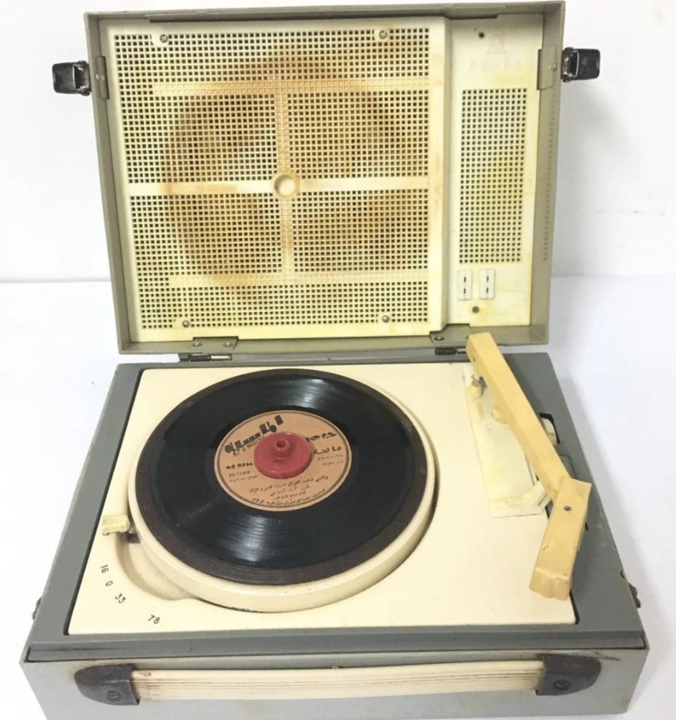 An old record player is being displayed