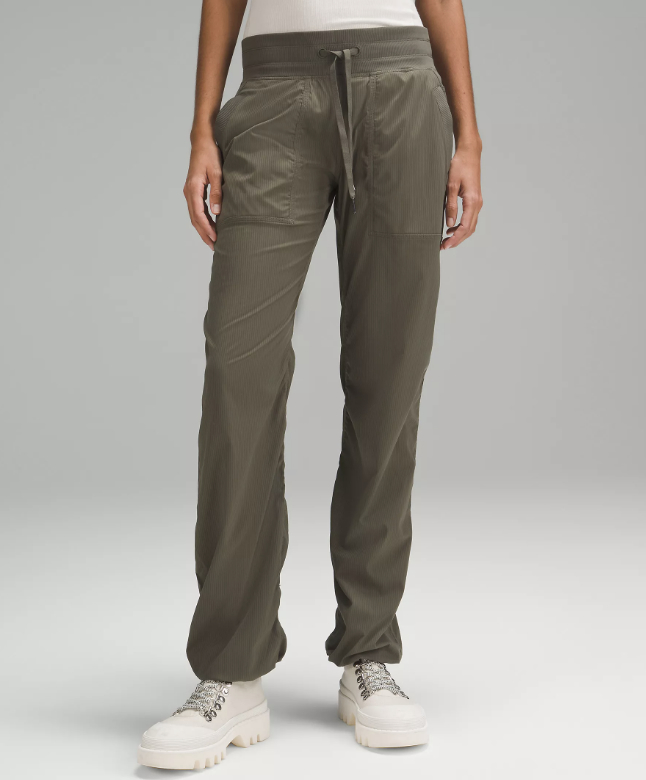An olive mid rise pant