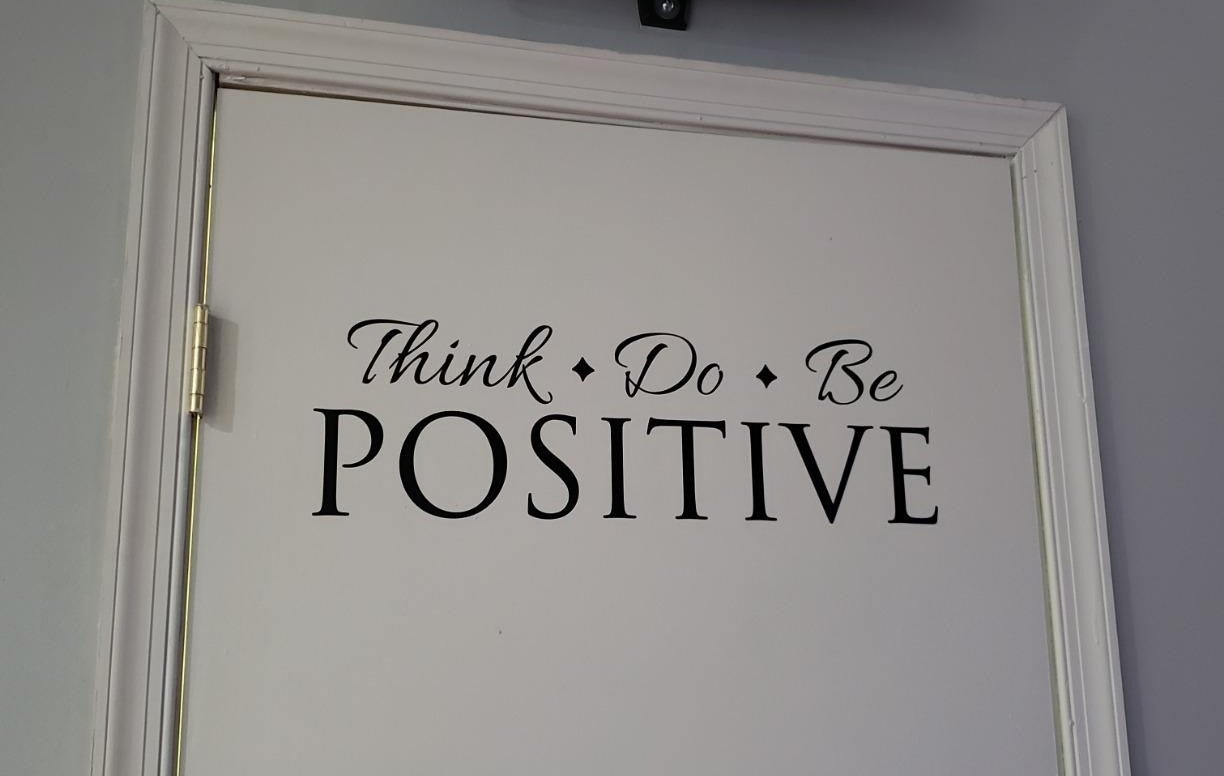a reviewer photo of the decal on a white door