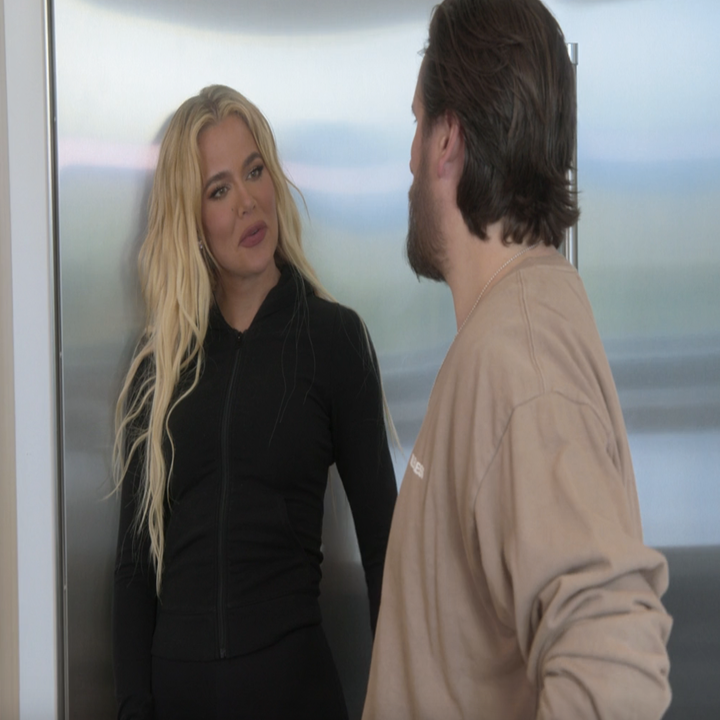 Close-up of Khloé and Scott in front of a refrigerator