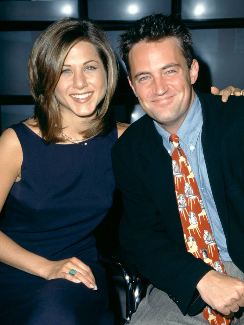 Close-up of Jennifer and Matthew sitting together and smiling