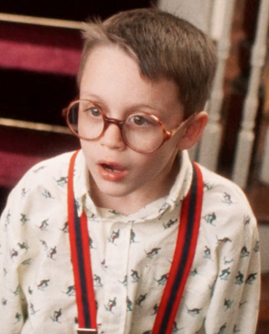 Close-up of Kieran in glasses and suspenders