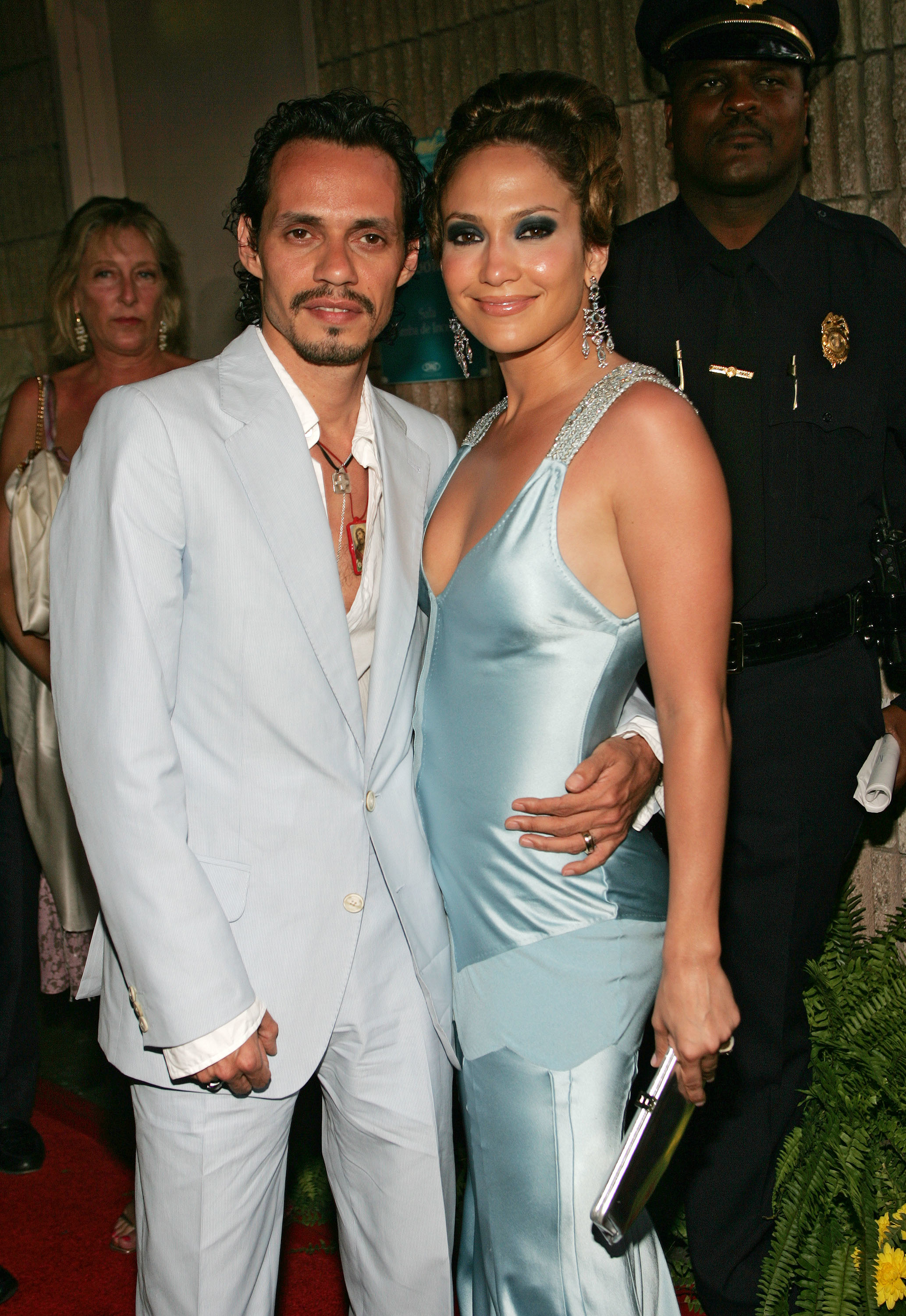 JLo on the red carpet in a sleeveless, satiny gown with Mark Anthony
