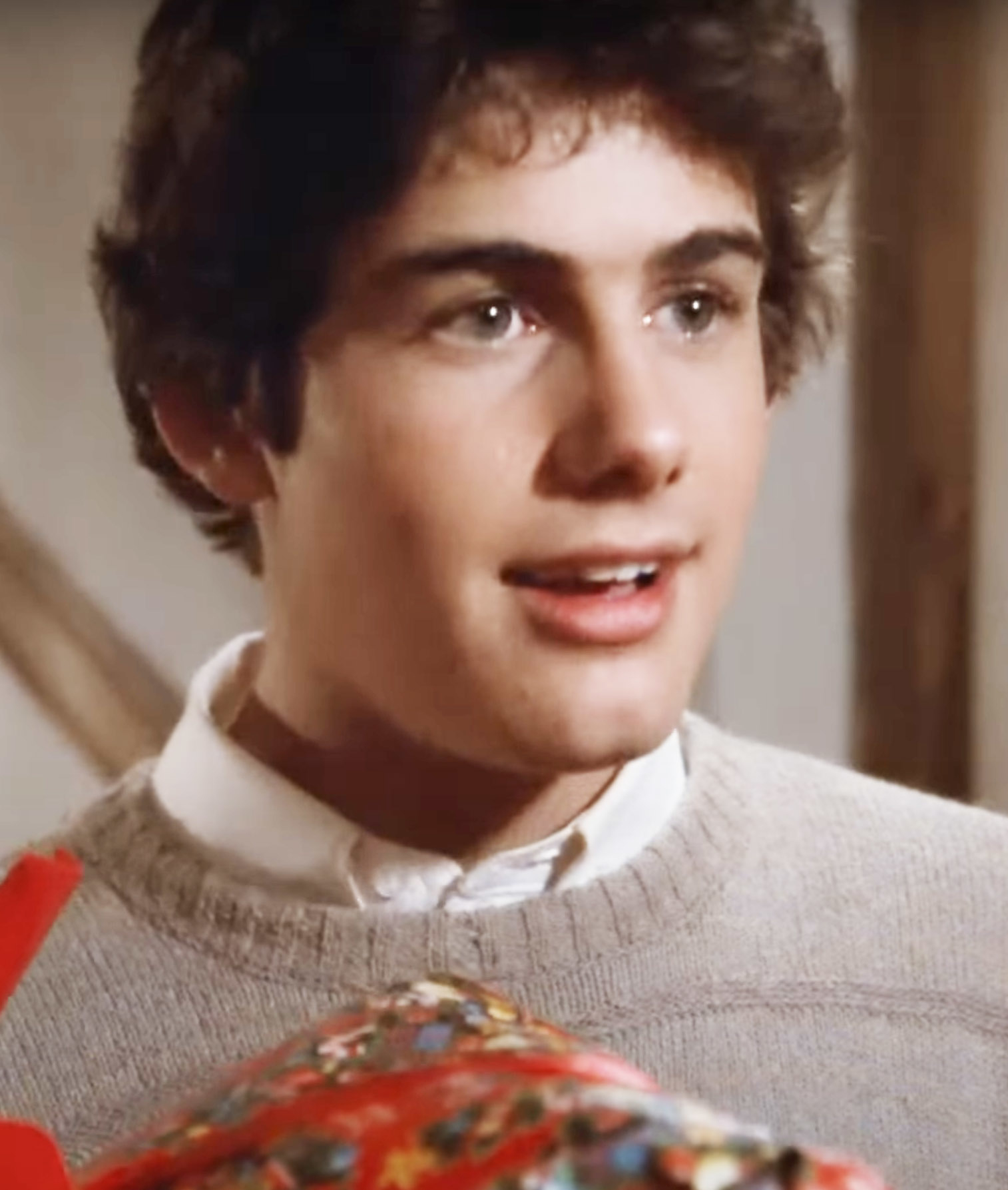 Close-up of Zach in a sweater