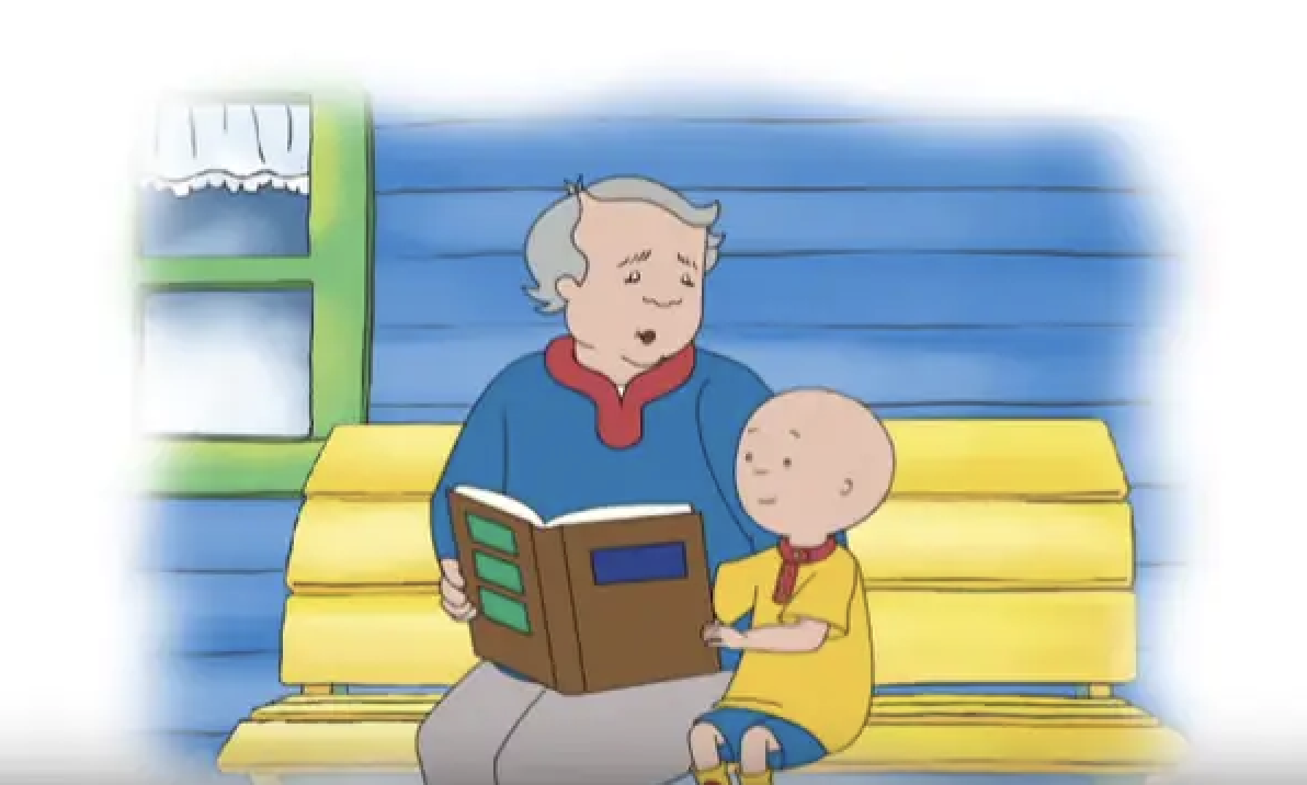 Caillou&#x27;s grandfather reads to him on a bench and the outline of the frame is blurred white.