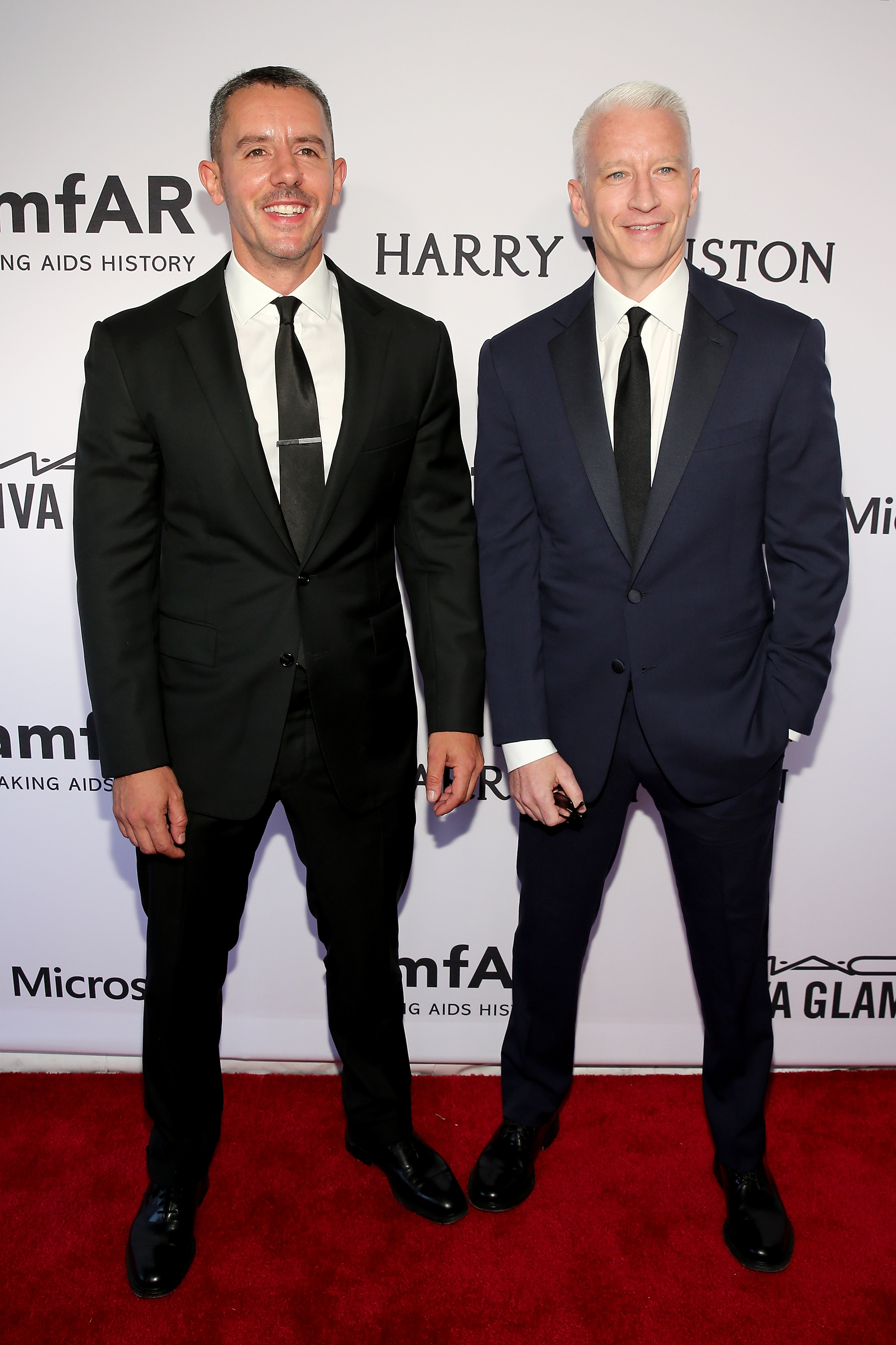 Benjamin and Anderson in suits and ties on the red carpet