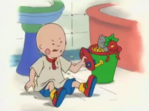 Caillou throws his toy down and starts kicking and screaming.