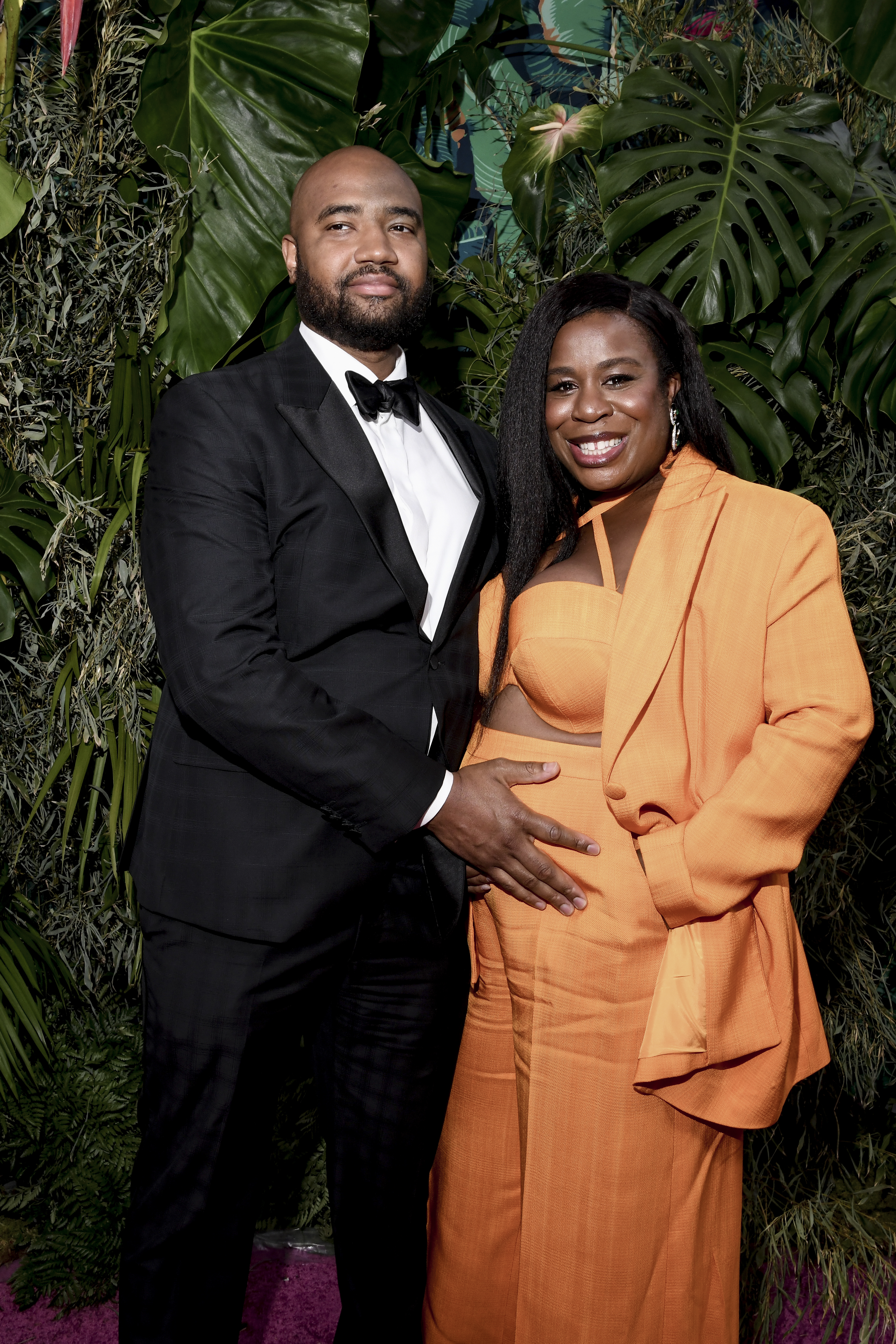 Robert Sweeting cradling Uzo Aduba's baby bump