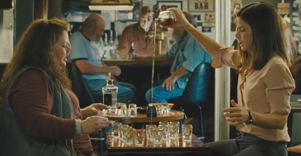 Detective Mullens and Agent Ashburn from "The Heat" are drinking shots