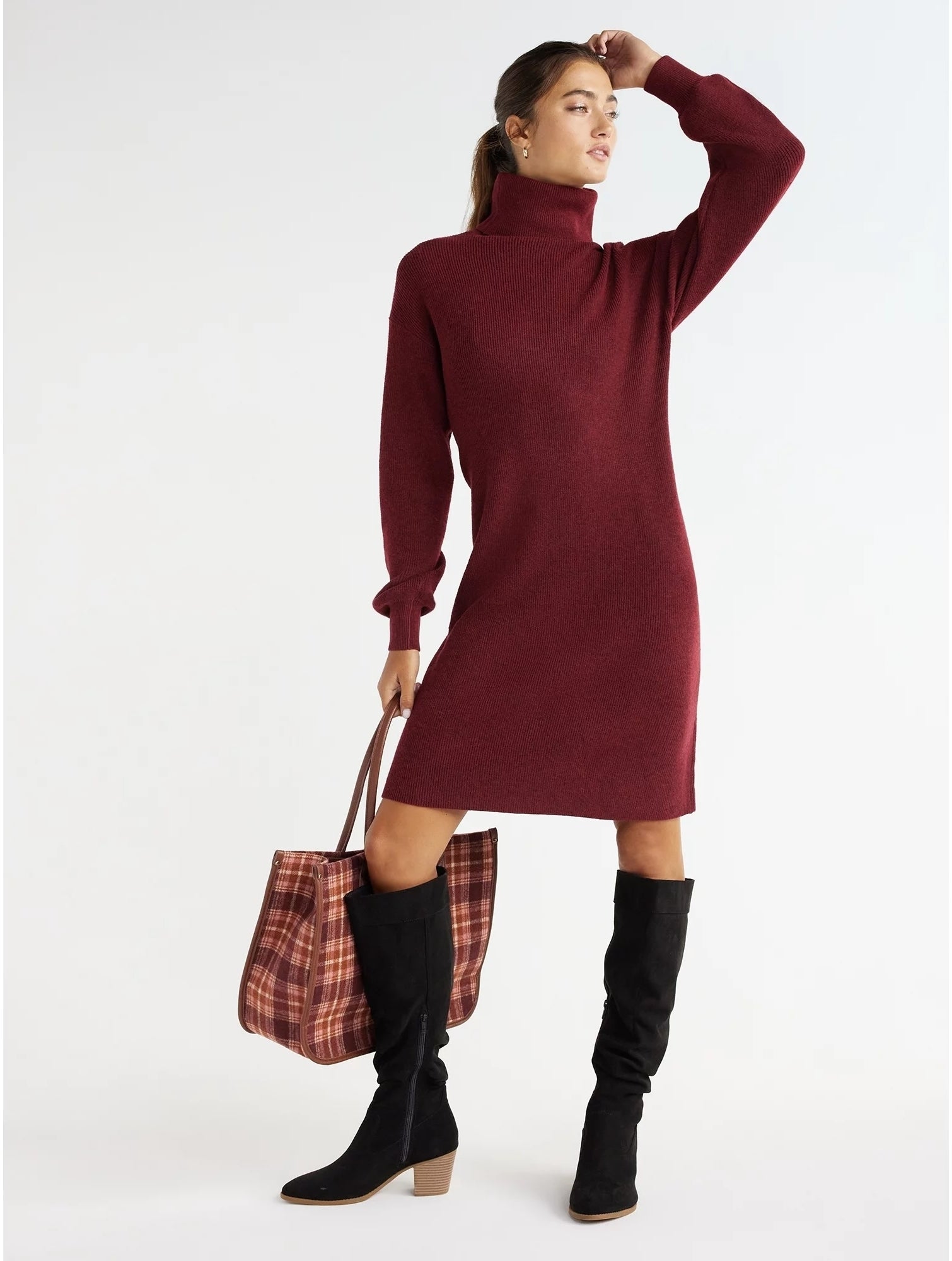 model wearing maroon turtleneck dress