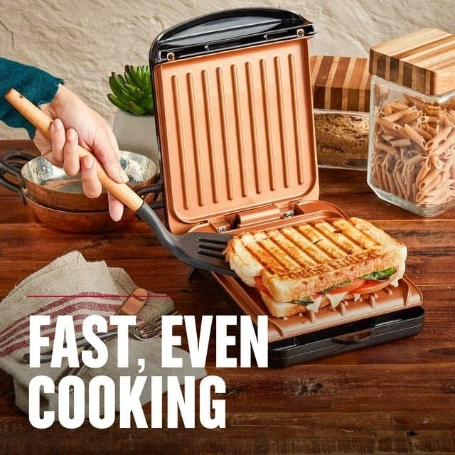 the George Foreman grill making a sandwich