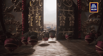 William Conker and Kevin the Carrot stand together in front of the key made from cheese