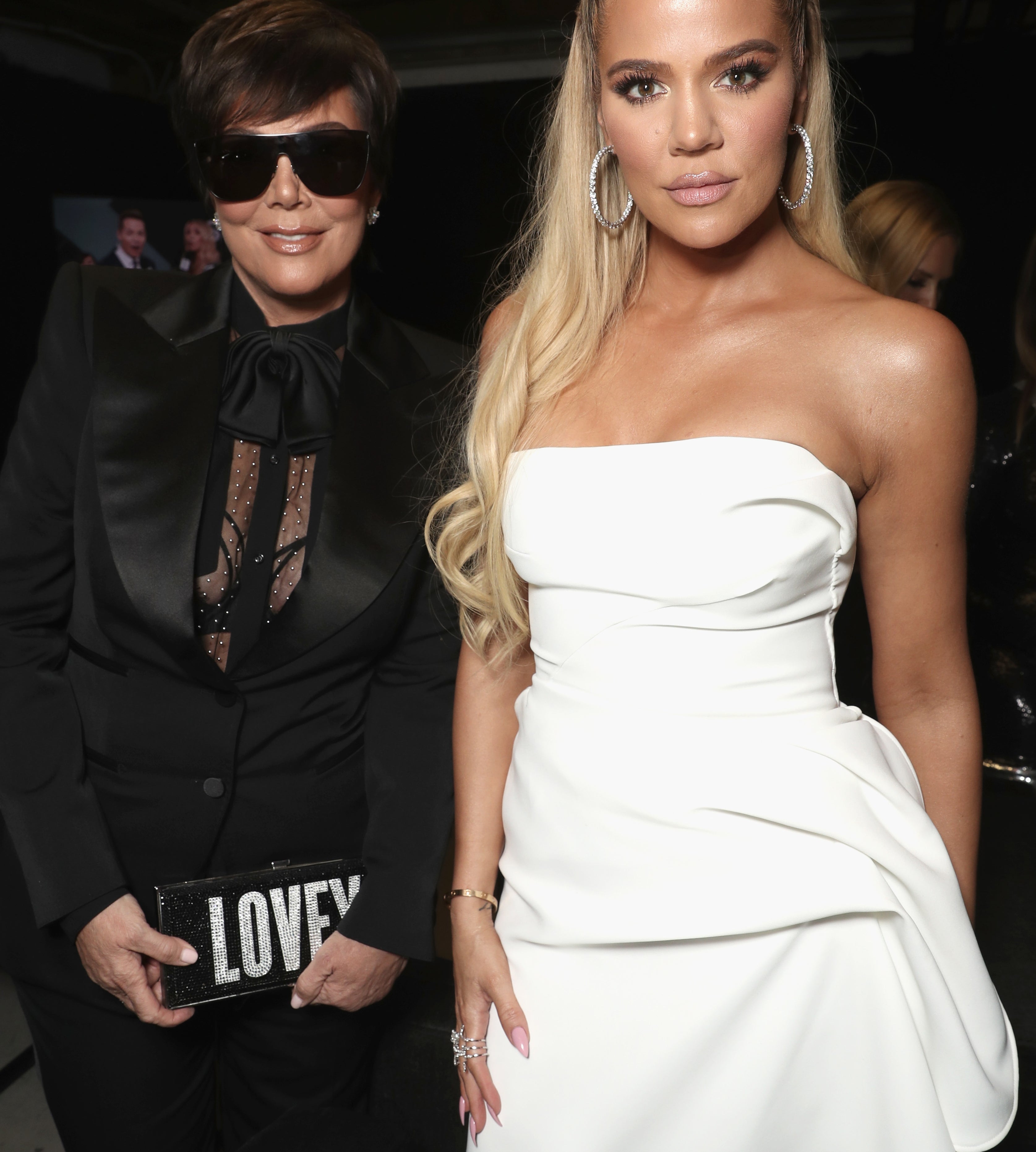 Close-up of Khloé and Kris standing together and smiling