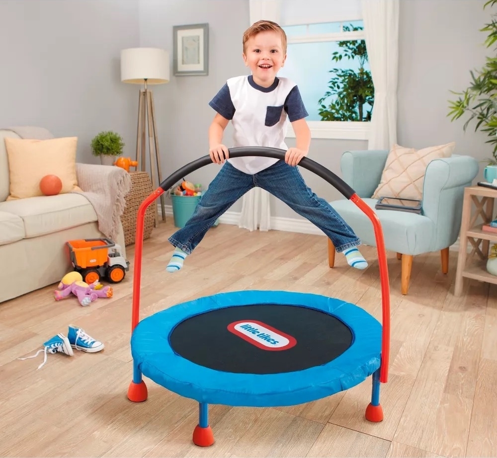 a child bouncing on the trampoline