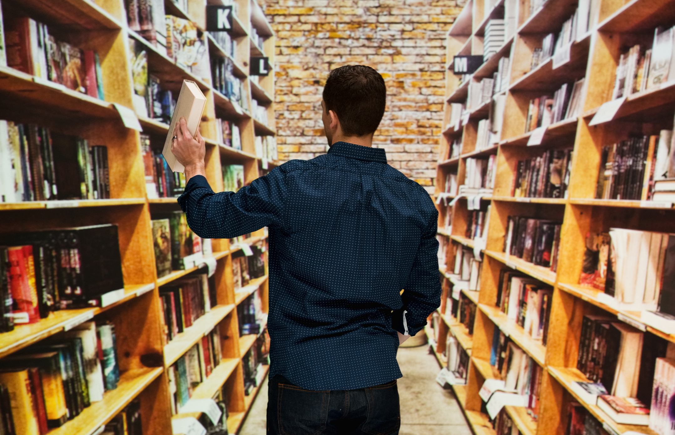 a man in a bookstore