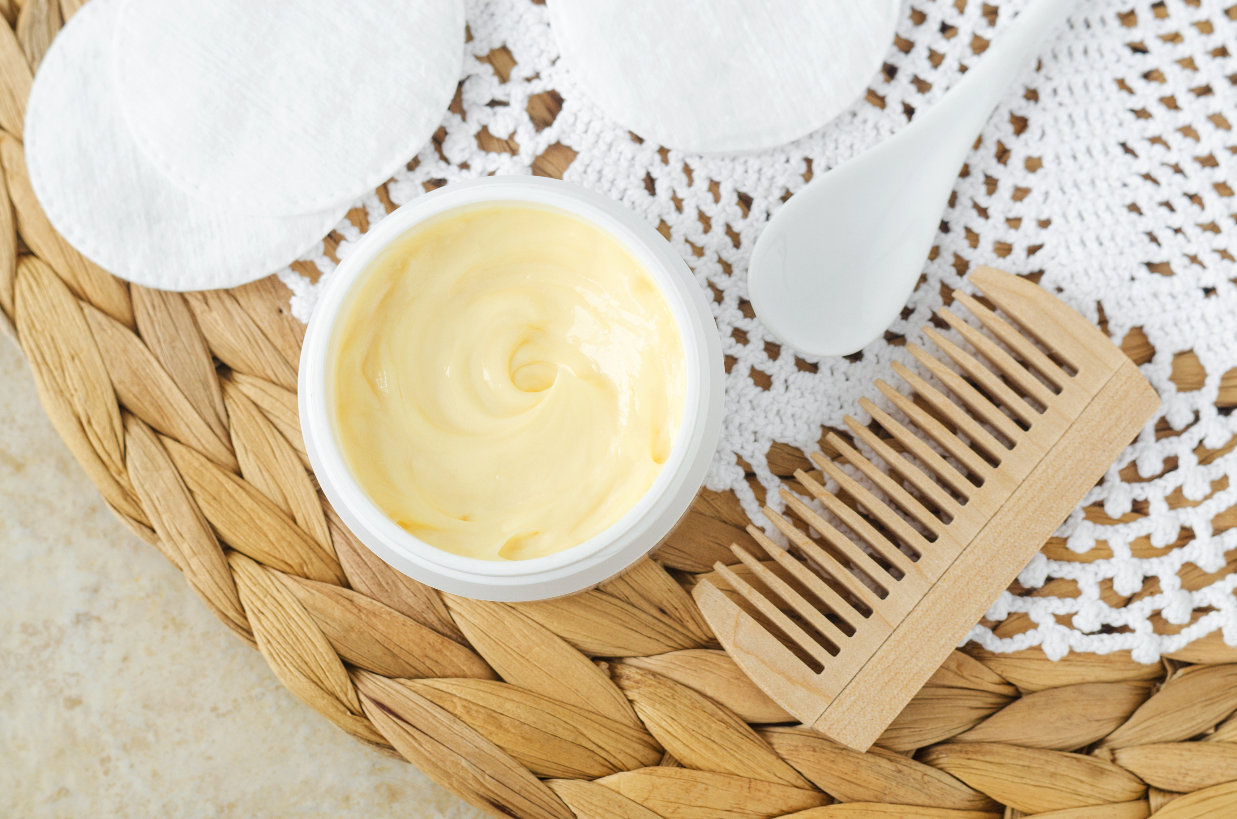 hair mask on a tray next to a comb