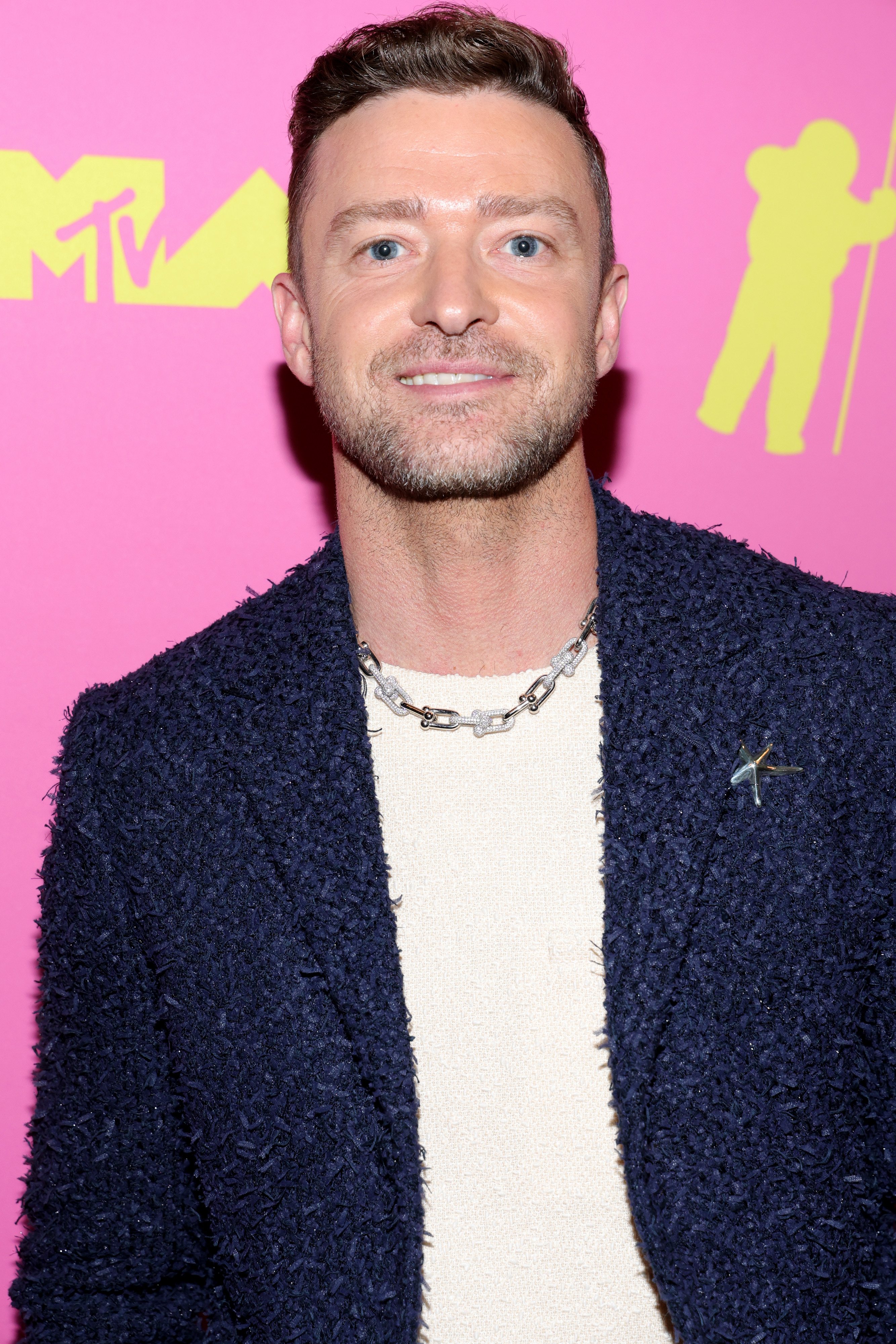 Closeup of Justin Timberlake smiling at an event
