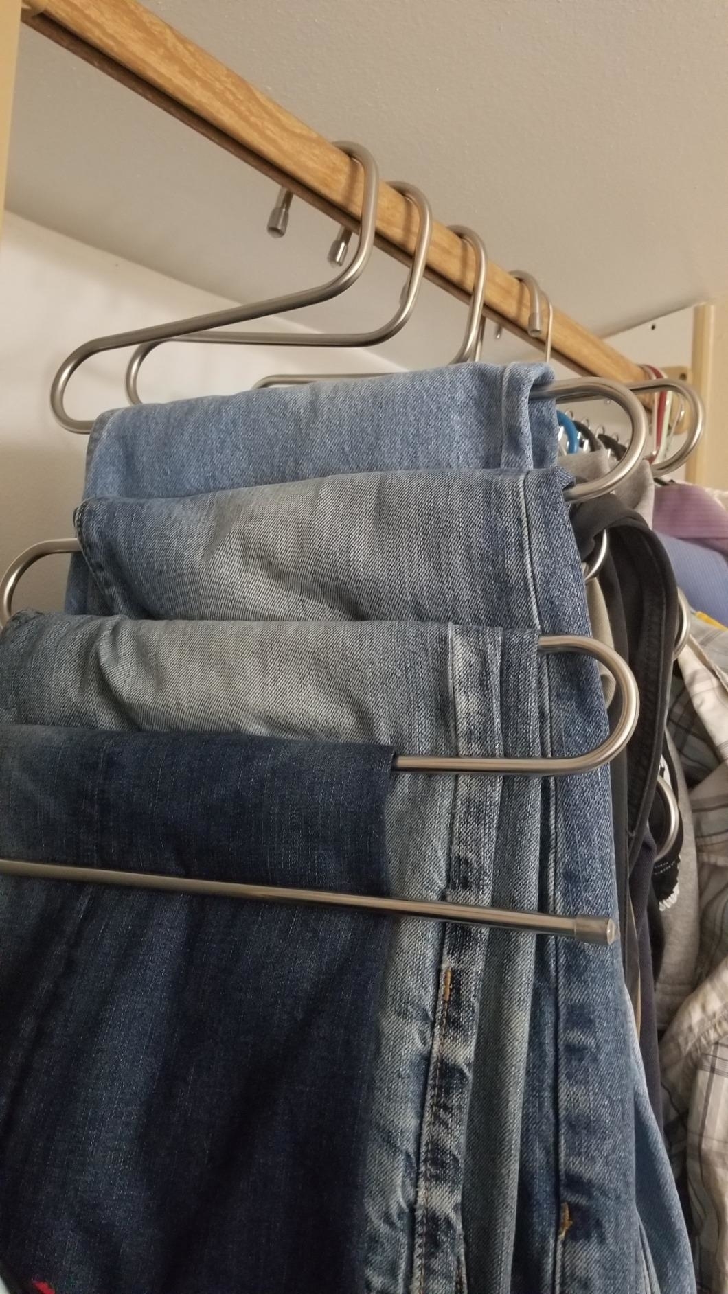 A reviewer&#x27;s jeans on the hanger