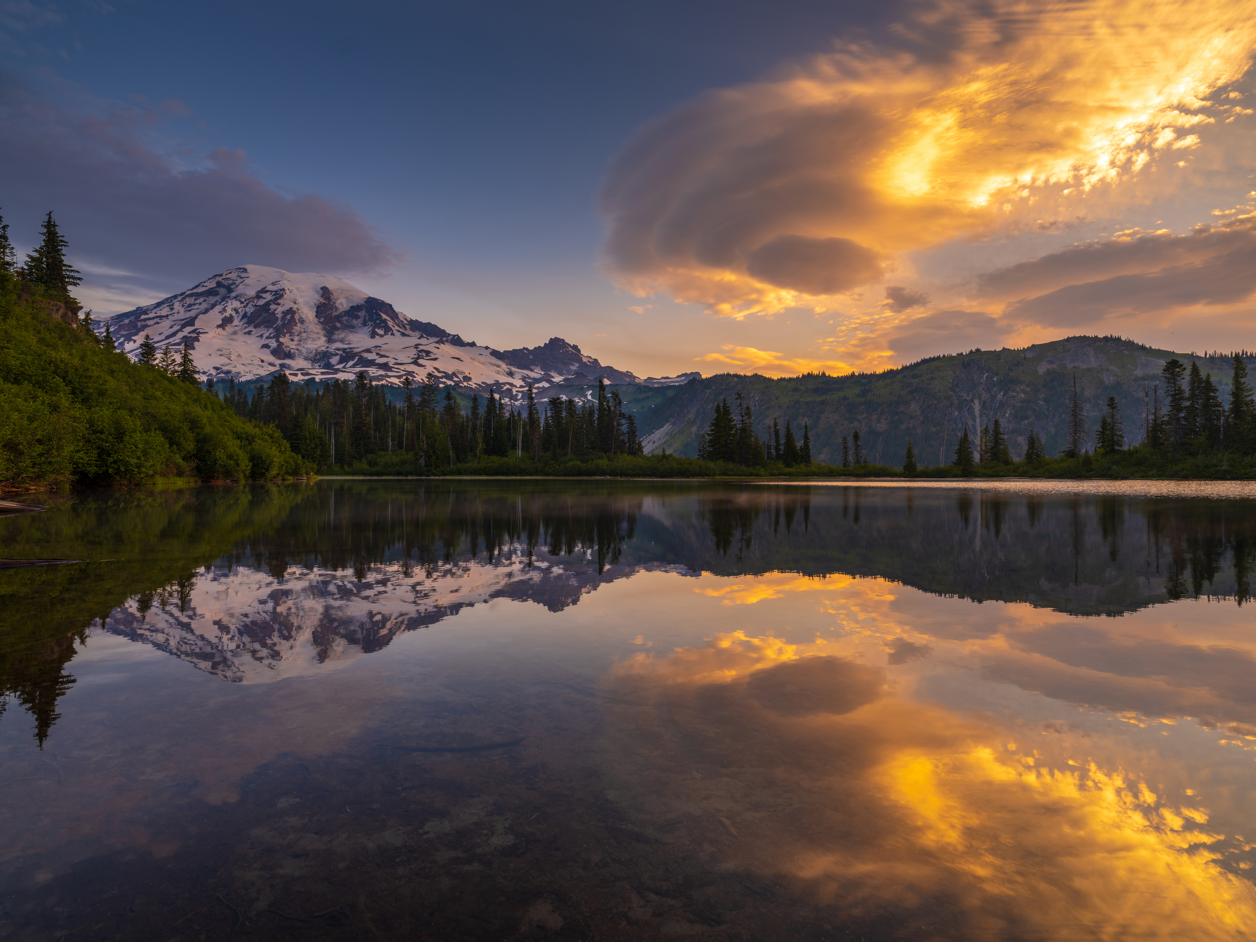 a wide view of the lake and Mount Rainier