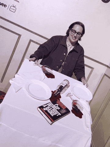 author pretending to flip a table