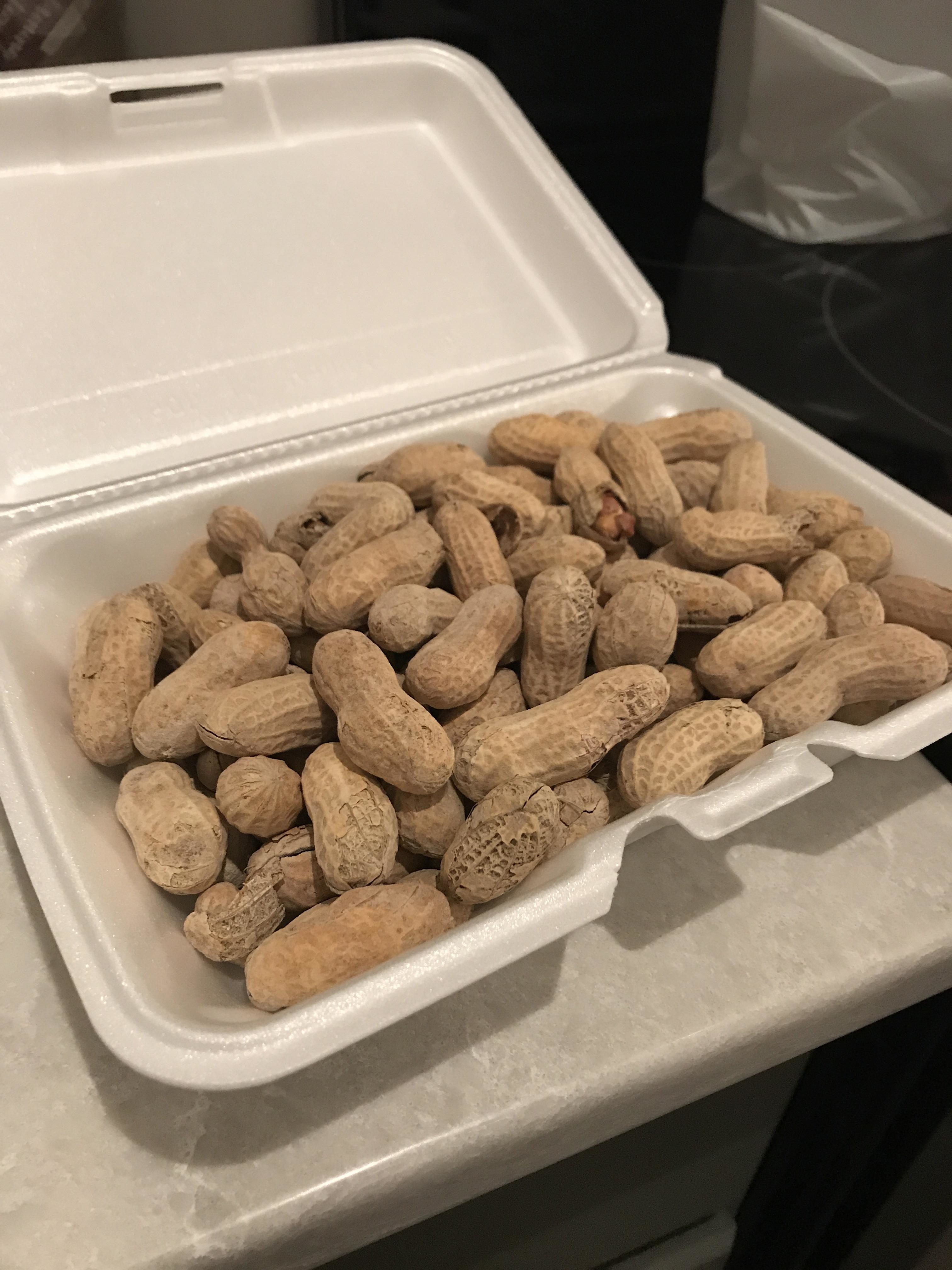 literally a styrofoam container with unshelled peanuts inside