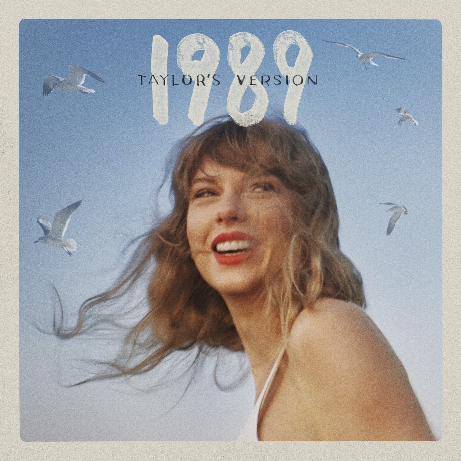 The album cover for 1989 (Taylor&#x27;s Version) showing Taylor smiling