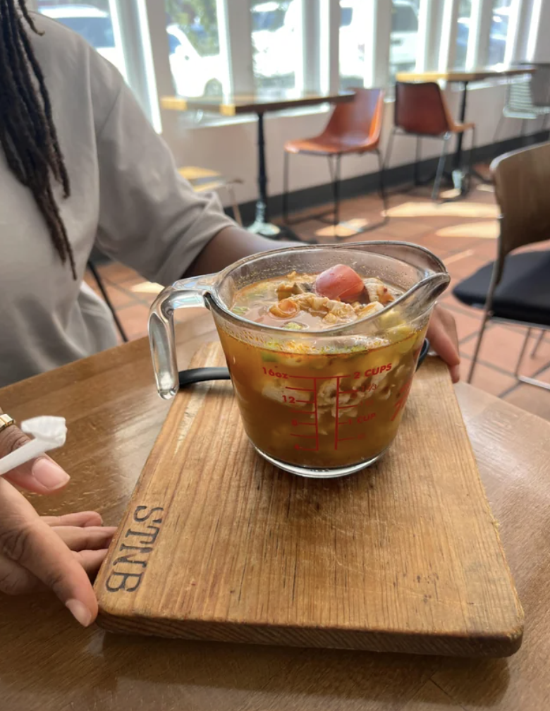 soup served in a measuring cup